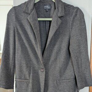 Soft gray blazer with flouncy back